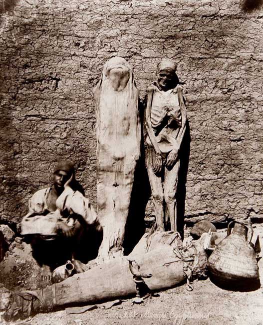 1875 photo of mummy seller in Thebes by French photographer Félix Adrien Bonfils.